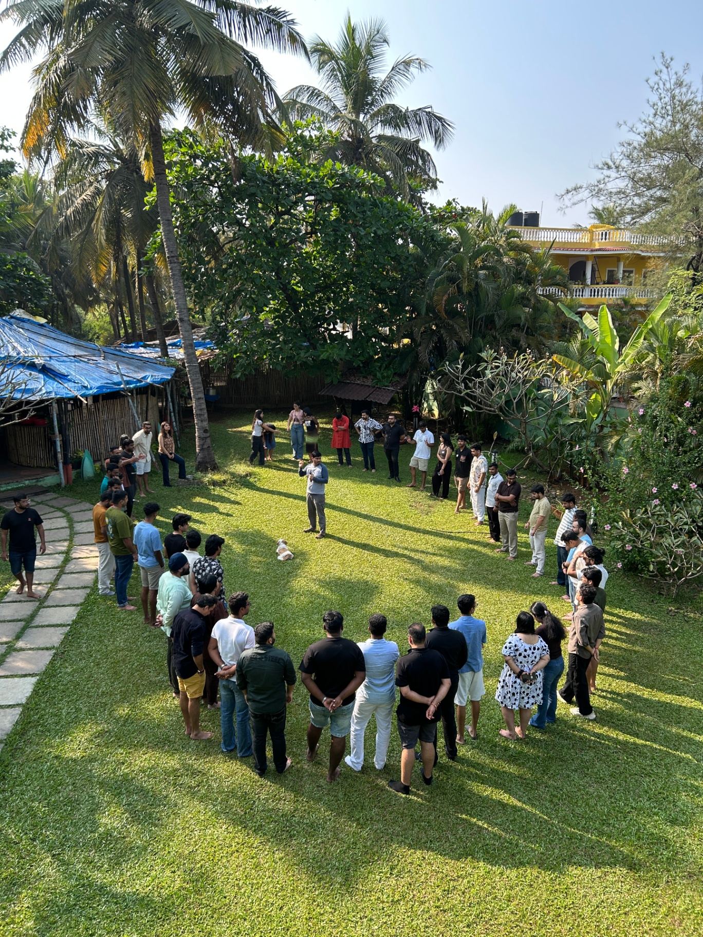 founders gathered on the lawn during a sewa session